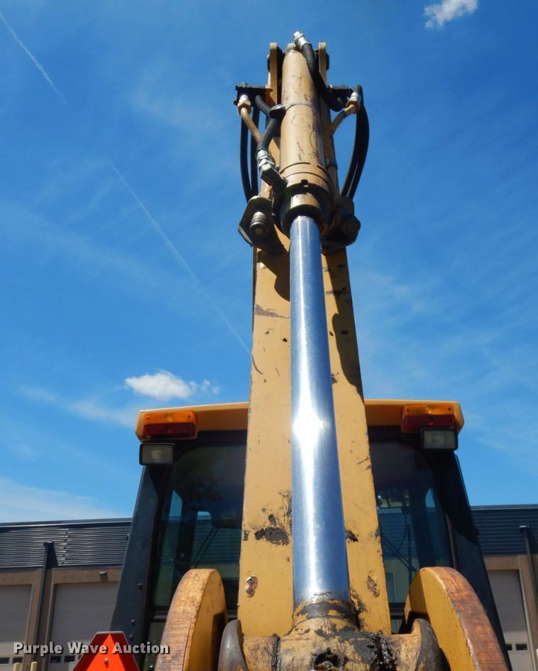 image for item IL9826 1999 John Deere 310E  backhoe