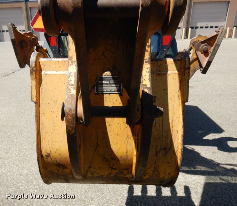 image for item IL9826 1999 John Deere 310E  backhoe