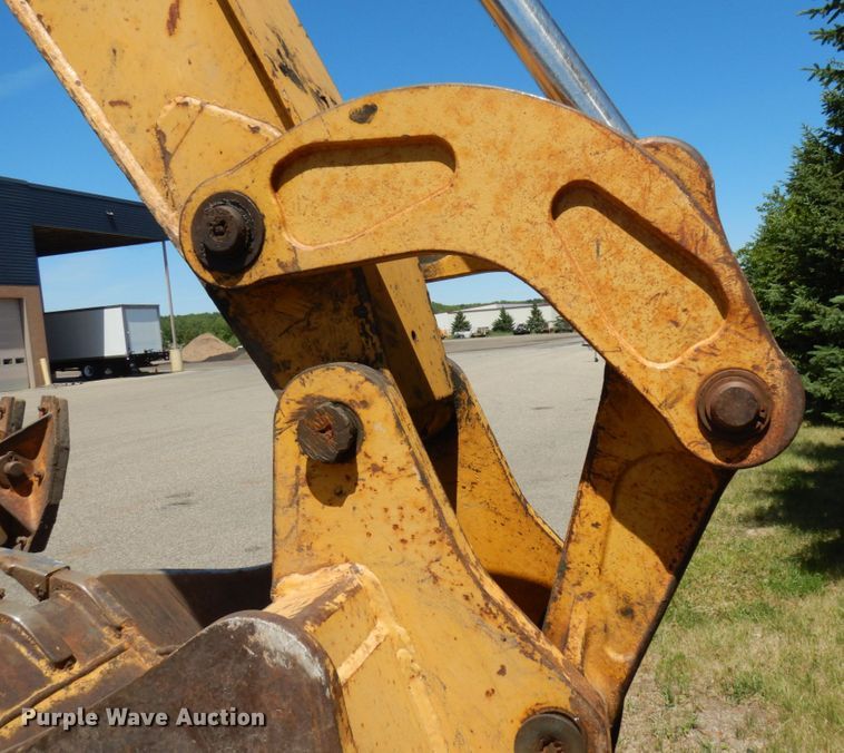 image for item IL9826 1999 John Deere 310E  backhoe