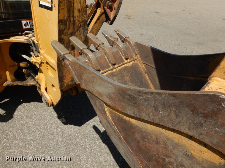 image for item IL9826 1999 John Deere 310E  backhoe