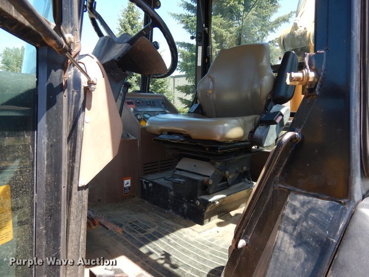 image for item IL9826 1999 John Deere 310E  backhoe