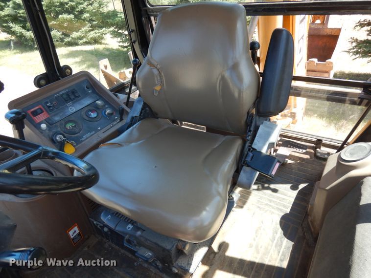 image for item IL9826 1999 John Deere 310E  backhoe