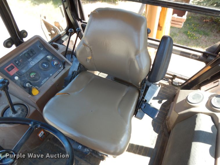 image for item IL9826 1999 John Deere 310E  backhoe