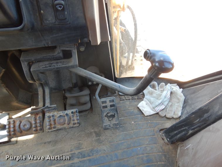 image for item IL9826 1999 John Deere 310E  backhoe