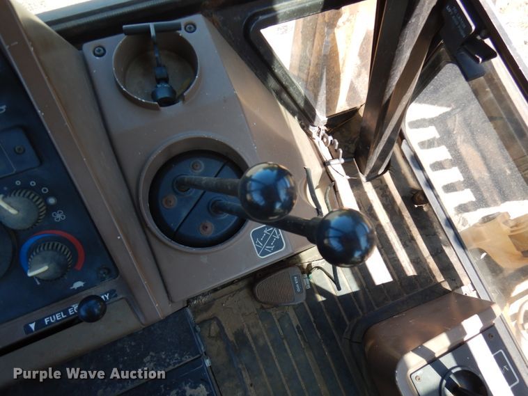 image for item IL9826 1999 John Deere 310E  backhoe