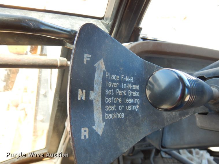 image for item IL9826 1999 John Deere 310E  backhoe