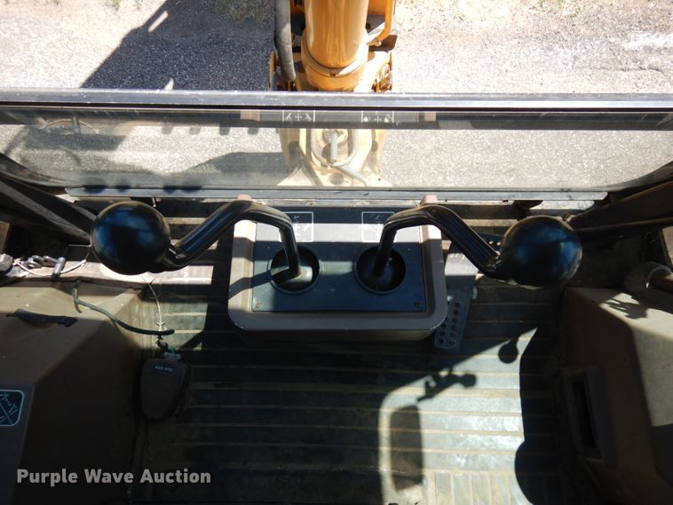 image for item IL9826 1999 John Deere 310E  backhoe