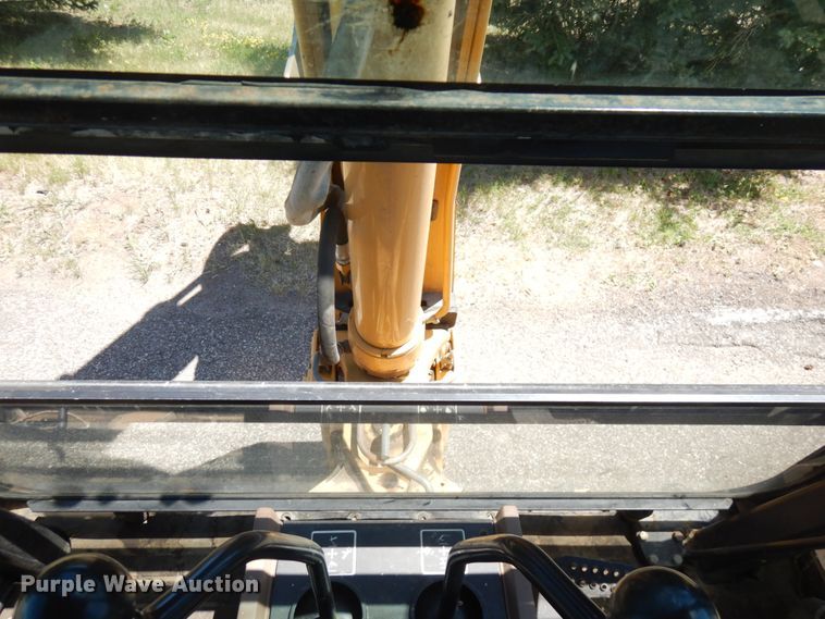 image for item IL9826 1999 John Deere 310E  backhoe