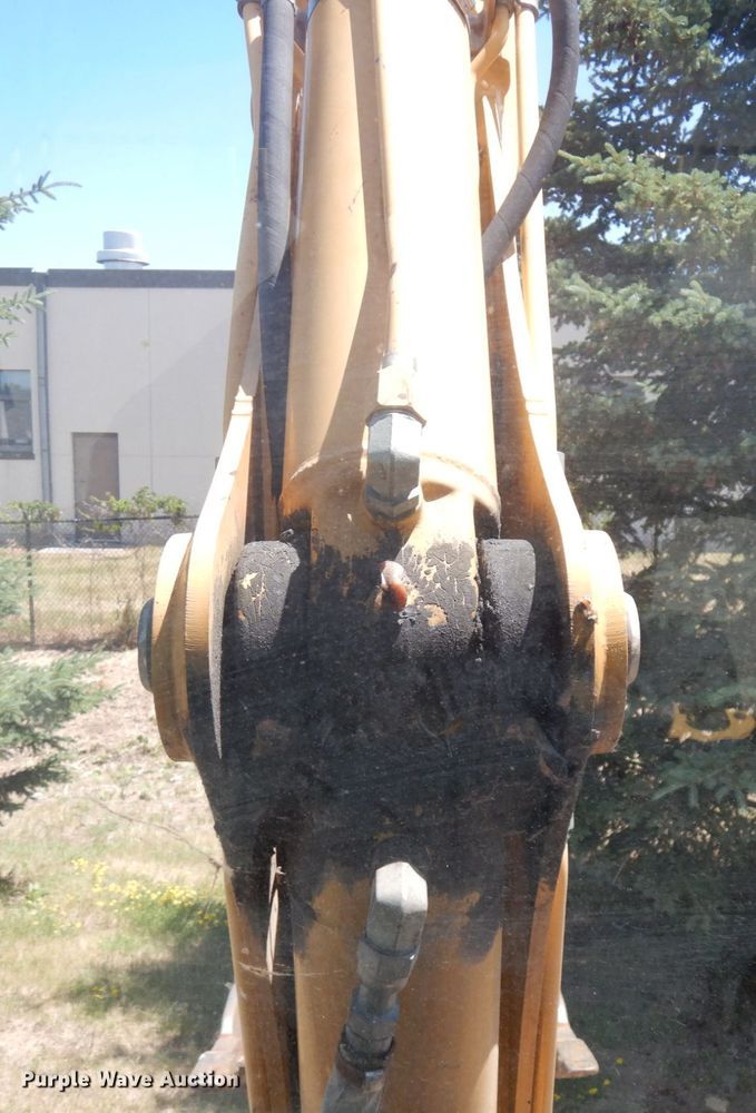 image for item IL9826 1999 John Deere 310E  backhoe