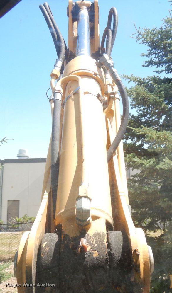 image for item IL9826 1999 John Deere 310E  backhoe