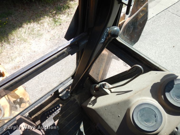 image for item IL9826 1999 John Deere 310E  backhoe