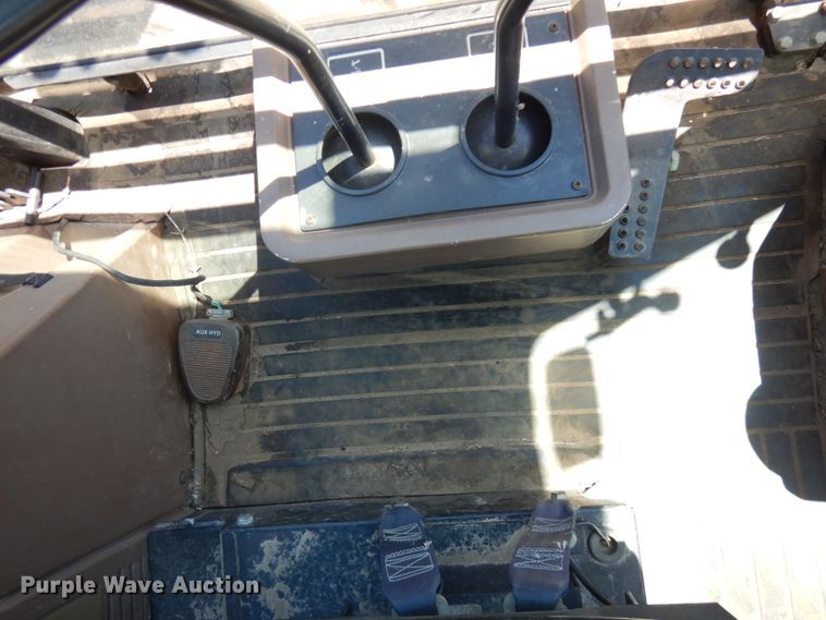 image for item IL9826 1999 John Deere 310E  backhoe