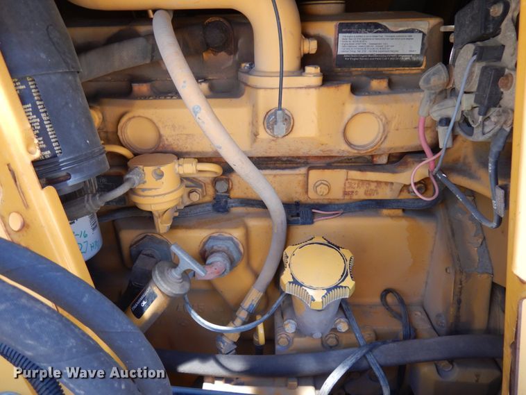 image for item IL9826 1999 John Deere 310E  backhoe