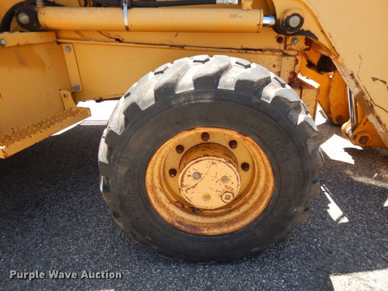 image for item IL9826 1999 John Deere 310E  backhoe