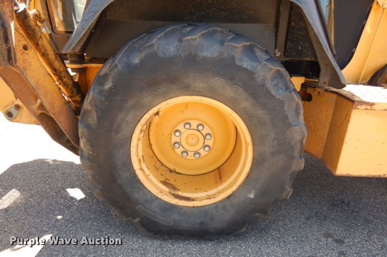 image for item IL9826 1999 John Deere 310E  backhoe