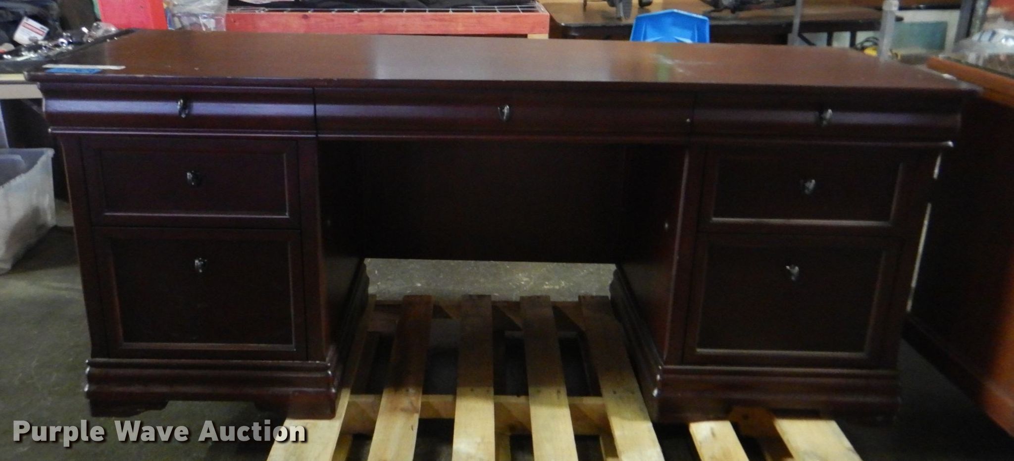 Wood desk in Tulsa, OK Item IE9296 sold Purple Wave