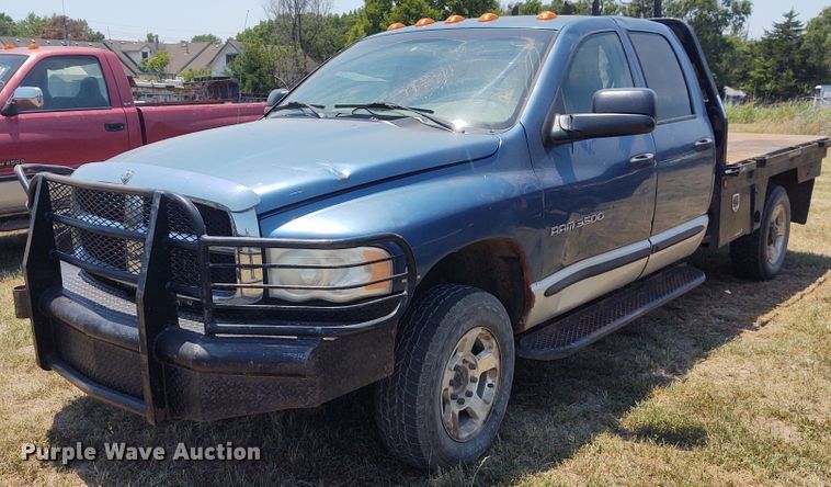 image for item BY9342 2005 Dodge Ram 3500  Quad Cab flatbed pickup truck
