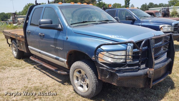 image for item BY9342 2005 Dodge Ram 3500  Quad Cab flatbed pickup truck