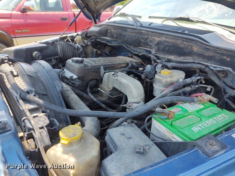 image for item BY9342 2005 Dodge Ram 3500  Quad Cab flatbed pickup truck