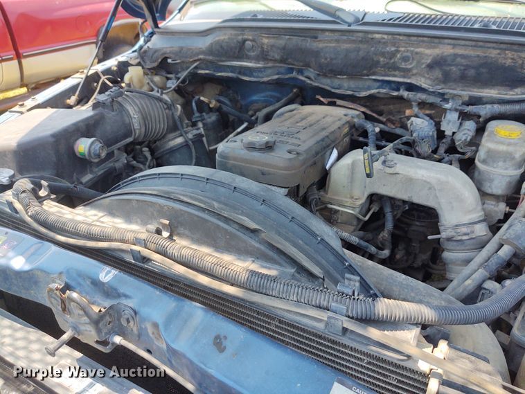 image for item BY9342 2005 Dodge Ram 3500  Quad Cab flatbed pickup truck