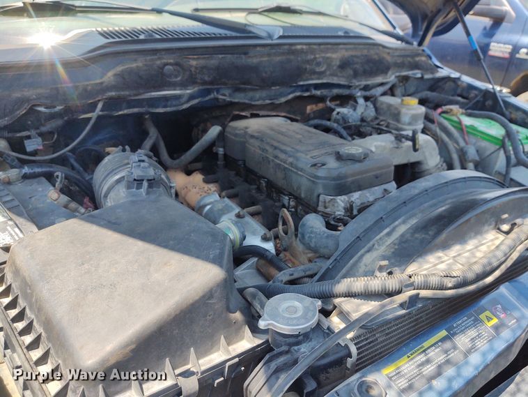 image for item BY9342 2005 Dodge Ram 3500  Quad Cab flatbed pickup truck