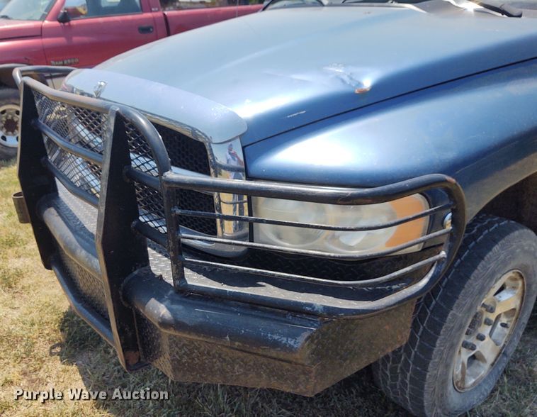 image for item BY9342 2005 Dodge Ram 3500  Quad Cab flatbed pickup truck