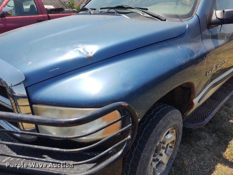 image for item BY9342 2005 Dodge Ram 3500  Quad Cab flatbed pickup truck