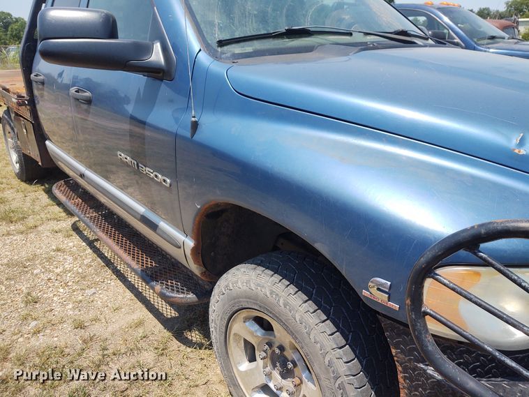 image for item BY9342 2005 Dodge Ram 3500  Quad Cab flatbed pickup truck