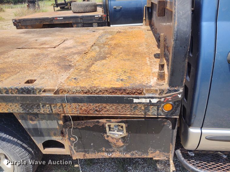 image for item BY9342 2005 Dodge Ram 3500  Quad Cab flatbed pickup truck