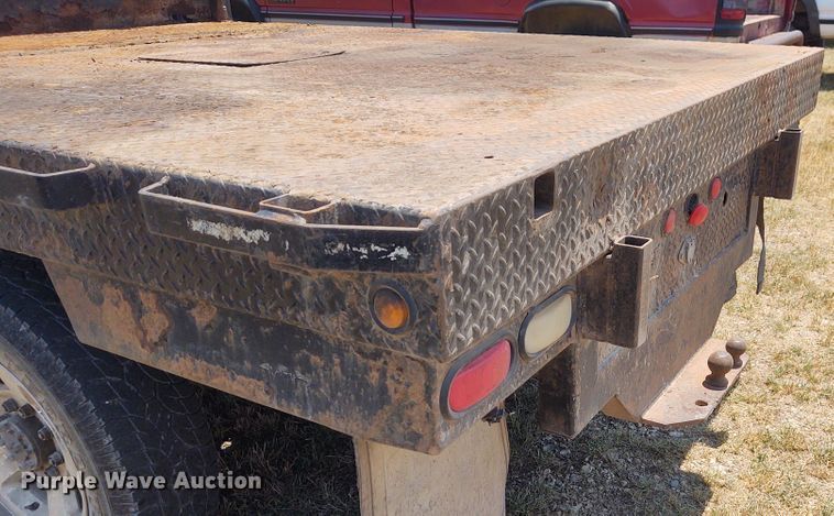 image for item BY9342 2005 Dodge Ram 3500  Quad Cab flatbed pickup truck