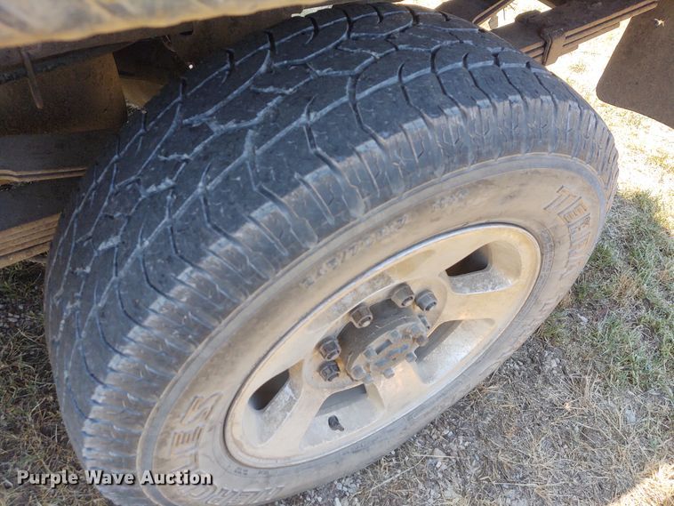 image for item BY9342 2005 Dodge Ram 3500  Quad Cab flatbed pickup truck