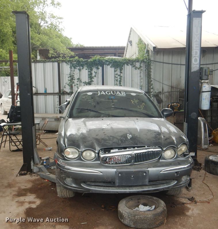 image for item DJ0548 Tuxedo TP9KF-TUX  two post automotive lift