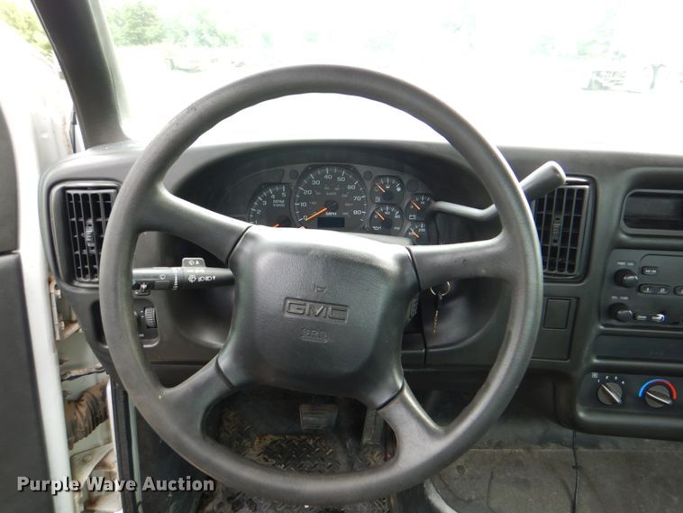 image for item DM3832 2003 GMC C4500  flatbed truck