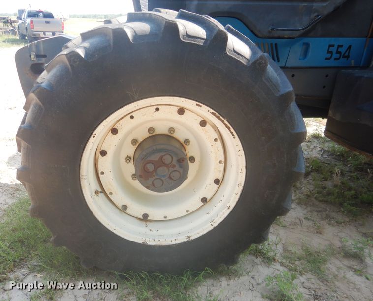 image for item IJ9448 1997 New Holland 8670  MFWD tractor