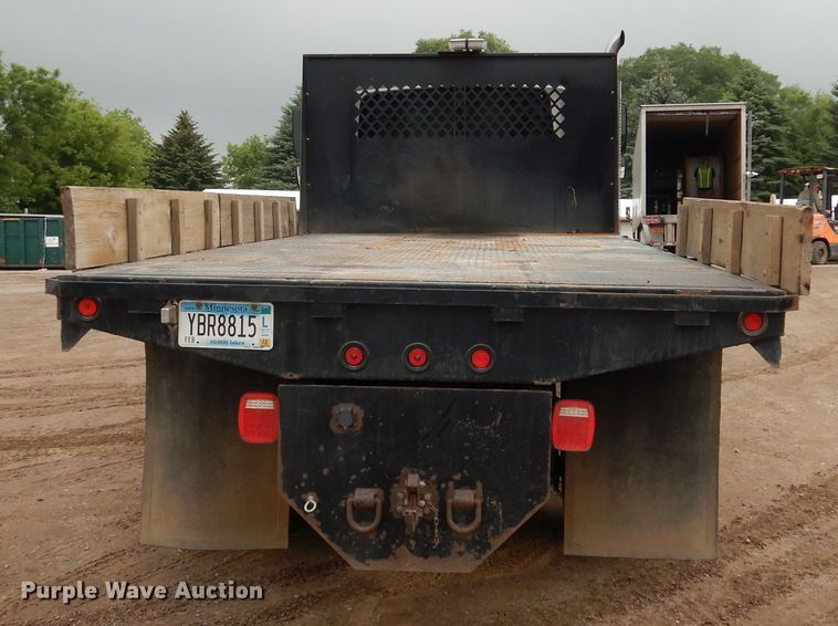 image for item AF9886 2003 International 4400  flatbed truck