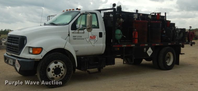 image for item DC2021 2000 Ford F650  flatbed truck with fuel / lube system