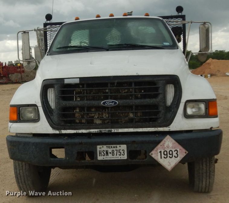 image for item DC2021 2000 Ford F650  flatbed truck with fuel / lube system