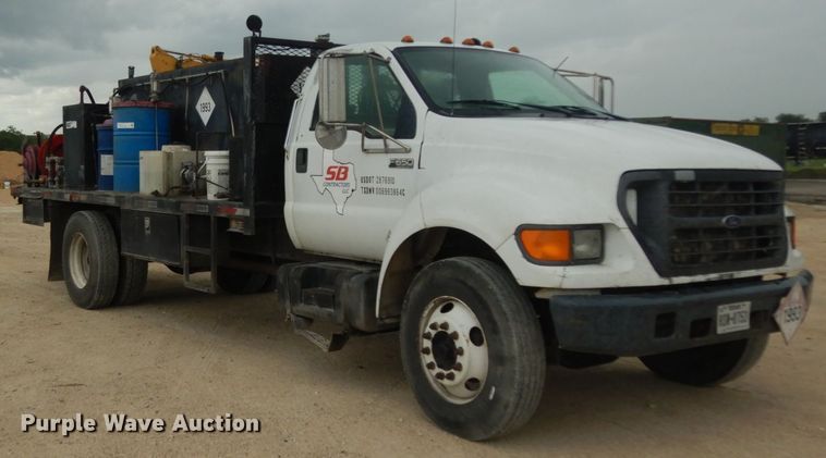 image for item DC2021 2000 Ford F650  flatbed truck with fuel / lube system