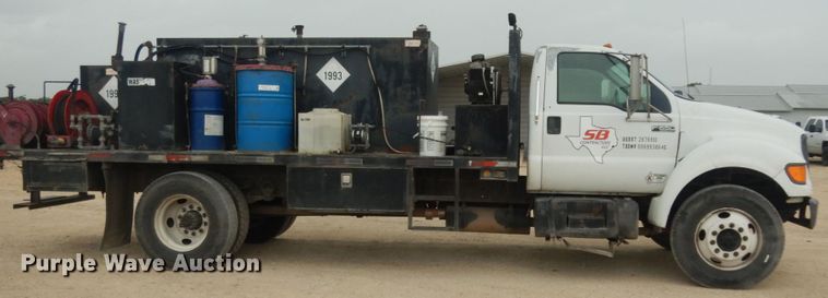 image for item DC2021 2000 Ford F650  flatbed truck with fuel / lube system