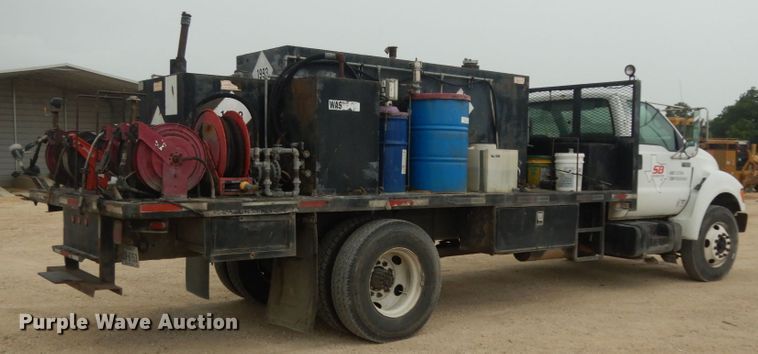 image for item DC2021 2000 Ford F650  flatbed truck with fuel / lube system