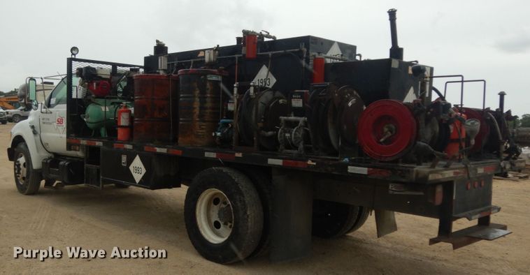 image for item DC2021 2000 Ford F650  flatbed truck with fuel / lube system