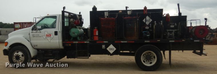 image for item DC2021 2000 Ford F650  flatbed truck with fuel / lube system
