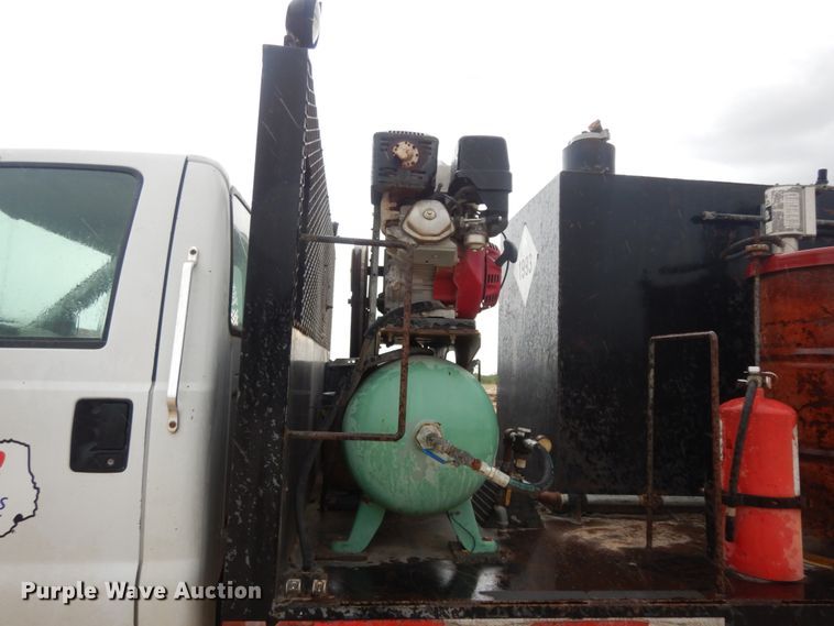 image for item DC2021 2000 Ford F650  flatbed truck with fuel / lube system