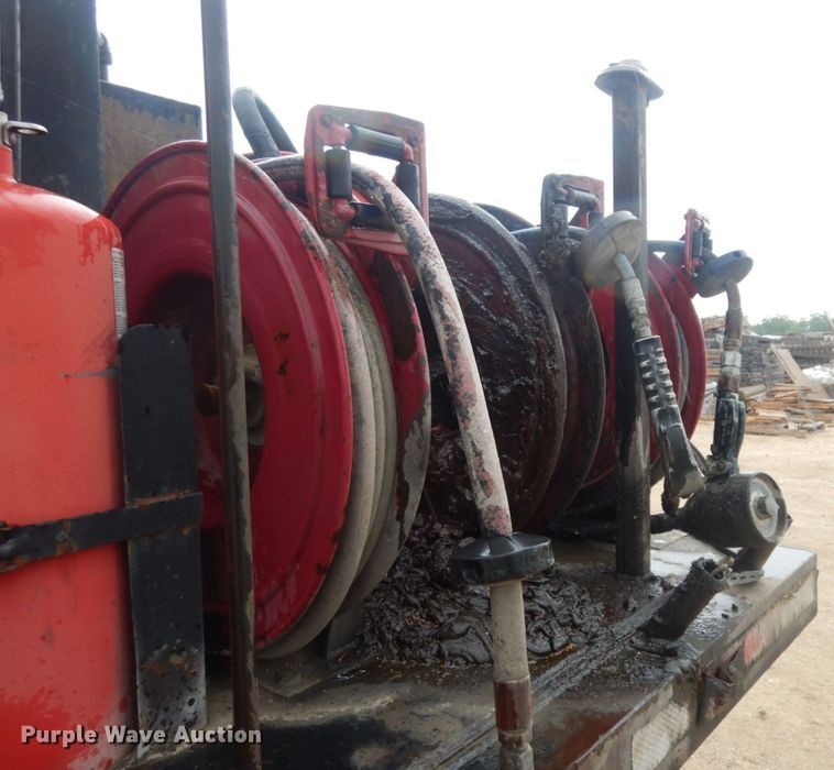 image for item DC2021 2000 Ford F650  flatbed truck with fuel / lube system