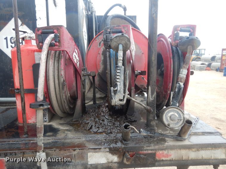 image for item DC2021 2000 Ford F650  flatbed truck with fuel / lube system