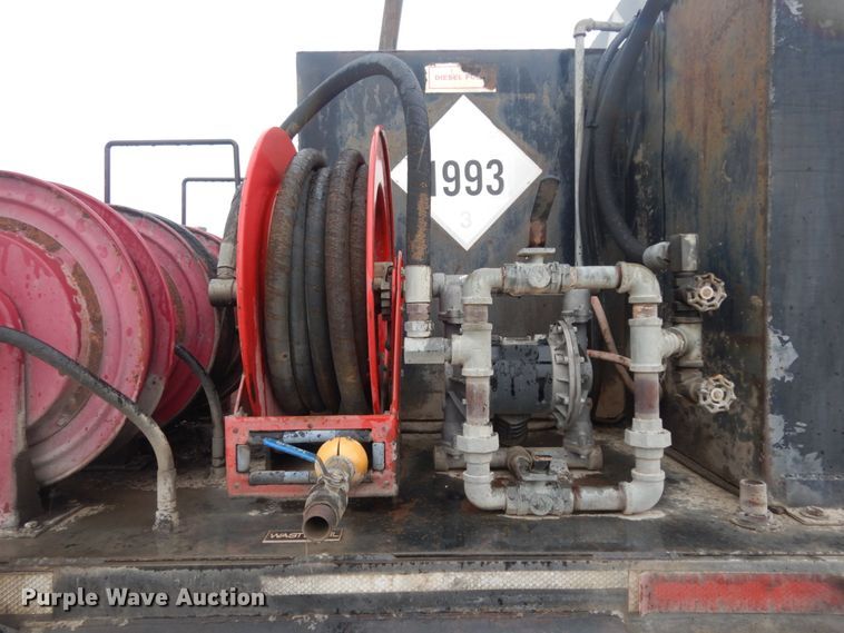 image for item DC2021 2000 Ford F650  flatbed truck with fuel / lube system