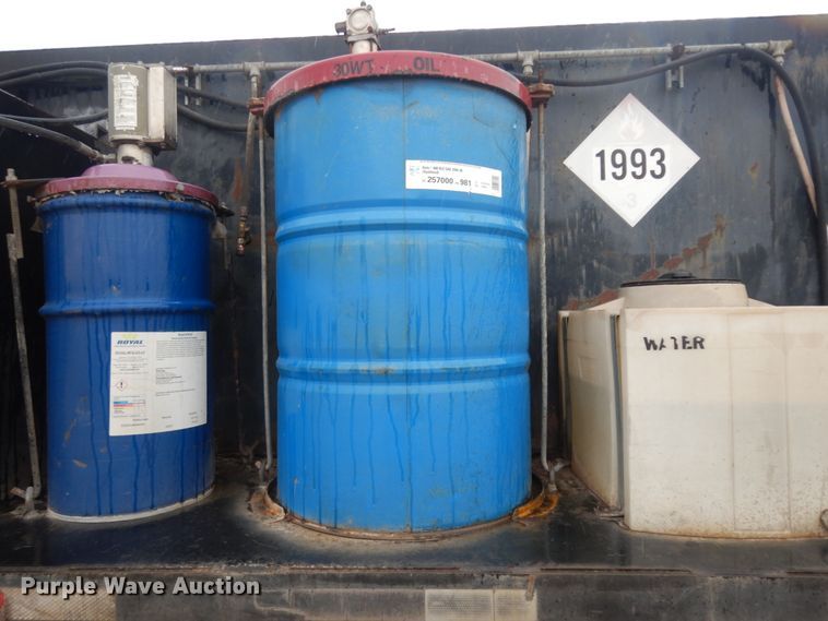 image for item DC2021 2000 Ford F650  flatbed truck with fuel / lube system