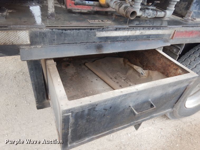 image for item DC2021 2000 Ford F650  flatbed truck with fuel / lube system