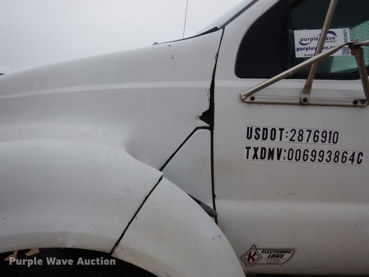 image for item DC2021 2000 Ford F650  flatbed truck with fuel / lube system