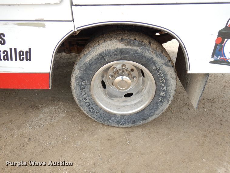 image for item DF6472 2011 Ford F350 Super Duty  SuperCab tow truck